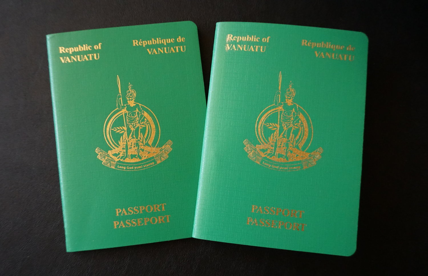 image of 2 green-cover Vanuatu Passports